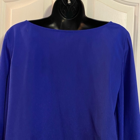 “BEBE” Brielle Bell Sleeve Asymmetrical Blouse - Picture 8 of 12